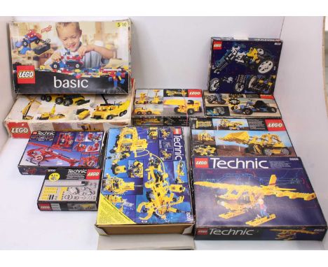 A large collection of vintage Technic Lego Sets, with examples including No. 856 Bulldozer, No. 854 Go Cart, No. 8855 Prop Pl