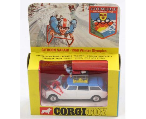 Corgi Toys No. 499 Citroen Safari 1968 Winter Olympics car, comprising white and blue body with blue interior, with two figur