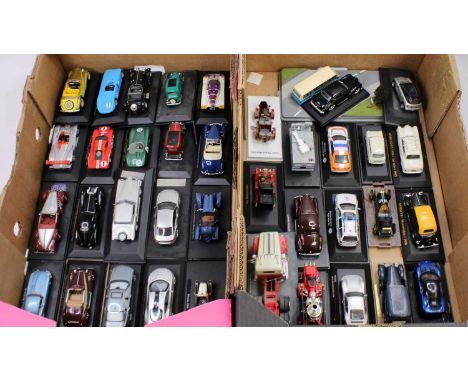 Two trays containing a collection of mainly 1/43 scale diecast vehicles to include a Premium X 1971 Stutz Black Hawk, Premium