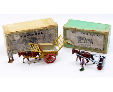 A pair of boxed Britains Home Farm Series horse-drawn farm attachments to include a No. F Britains Tumbrel Cart , together wi