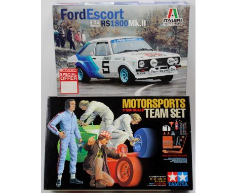 An Italeri No. 3655 1/24th scale Ford Escort RS1800 MkII, together with a Tamiya 1/12th scale Motorsports Team Set, both as i
