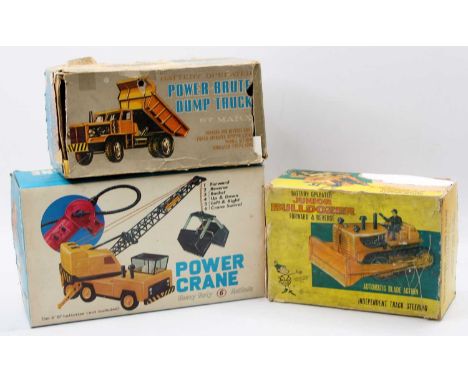 3 various boxed Marx and Hercules Construction tinplate and plastic vehicles, to include Junior Bulldozer and others
