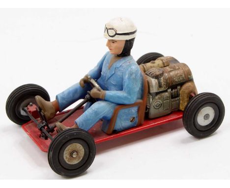 Schuco No.1055 "Go-Kart" comprising of red and grey lithographed engine detail with driver in red overalls with white crash h