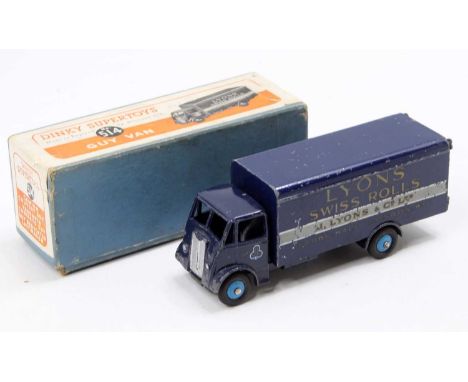 Dinky Toys No. 514 Lyons Swiss Rolls Guy Van, dark blue body with light blue hubs and Lyons Swiss Rolls livery, housed in the