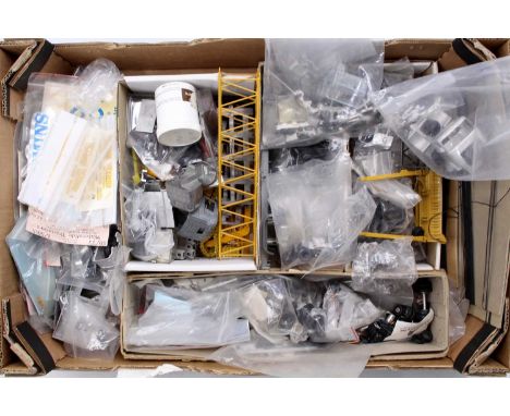 A large box containing a quantity of various mainly 1/50 and 1/48 scale white metal plastic and resin spare parts for model m