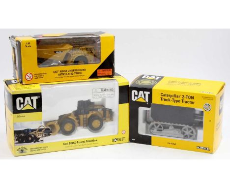 A Norscot and ERTL boxed Caterpillar construction vehicle group to include an ERTL No. 2438 Caterpillar 2-ton track type trac