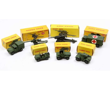 Dinky Toys boxed military group of 7 comprising No. 674 Austin Champ, No. 641 Army 1 Ton Cargo Truck, No. 673 Scout Car, No. 