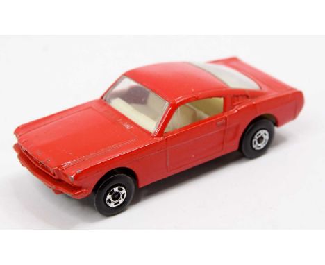 Matchbox Lesney Superfast No. 8 Ford Mustang, red body with a white interior, some light play-wear, loose example (VG-E)