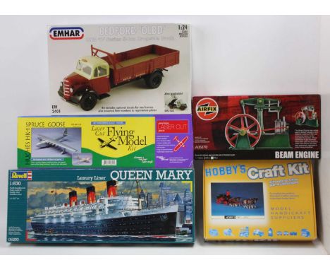 A collection of mixed model kits comprising a Revell 1/570th scale Queen Mary Ocean Liner, an Emhar 1/24th scale Bedford LWB 