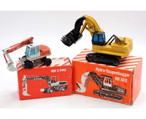 An NZG 1/50 scale boxed O&amp;K earth moving vehicle group to include a No. 246 RH30-C hydraulic excavator, together with a N