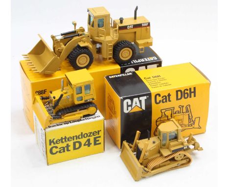 An NZG 1/50 scale boxed Caterpillar Construction diecast group to include an NZG No. 205 Caterpillar D4E bulldozer together w