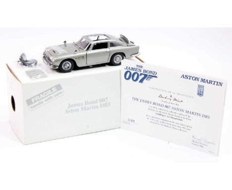 Danbury Mint 1/24th scale James Bond Aston Martin DB5 finished in silver, dark grey interior, chrome trim with working featur