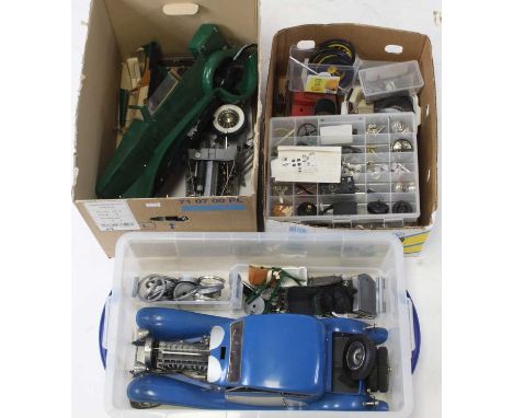 3 boxes containing a collection of Pocher 1/8th scale plastic, white metal, leather and brass model kit components and spare 