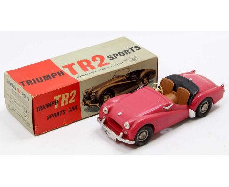 Victory Industries 1/18th scale plastic model of a Triumph TR2 Sports Car, red body, with black seats, missing windscreen, ho