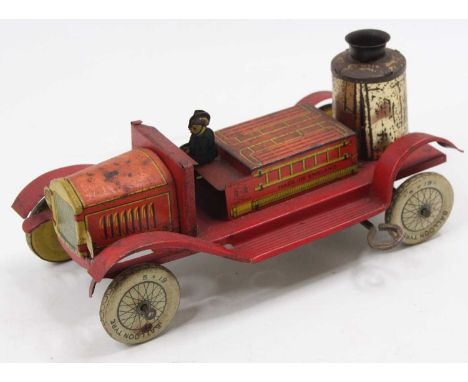 An early 20th century tinplate and clockwork model of a Wells Fire Engine, fixed key mechanism, length 17cm