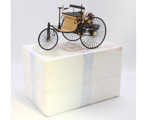 A Franklin Mint 1/8 scale diecast model of a 1986 Benz patent motor wagon housed in the original polystyrene packed box