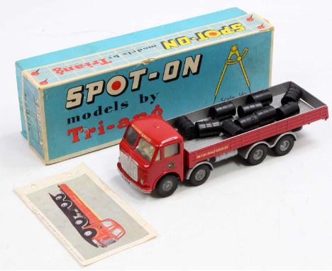 A Spot-On models by Tri-Ang No. 109/3 ERF 68G with flat float comprising of red cab and back with silver chassis and BRS Brit