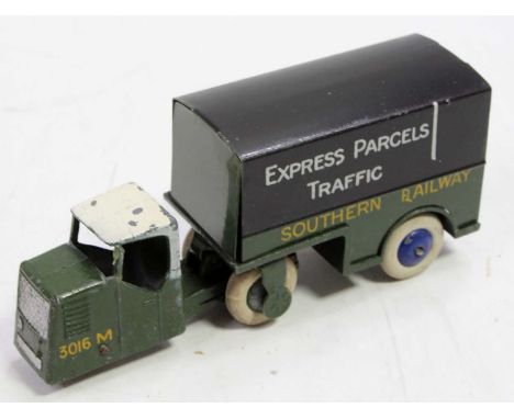 Dinky Toys pre-war 33 Series Mechanical Horse &amp; Trailer comprising a green cab with a white roof, and smooth green wheel 