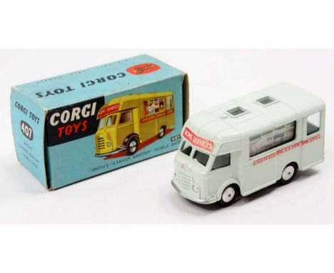 Corgi Toys, 407 Smiths Karrier Bantam mobile shop, pale blue body with red logo, smooth hubs, in the original blue all-card b