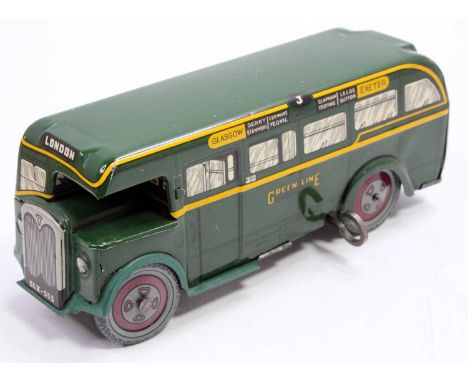 A Wells Brimtoy tinplate and clockwork Green Lines public transport bus comprising dark green and yellow body with balloon ty