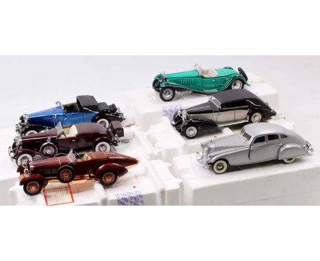 Six Franklin Mint 1/24 scale diecast vehicles to include a 1935 Duzenberg J550, a 1939 Mayback Zeppelin, a 1933 Pierce Silver