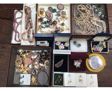 Vintage costume jewellery to include a silver powder compact, coral and silver dress ring, vintage brooches, Trifari necklace