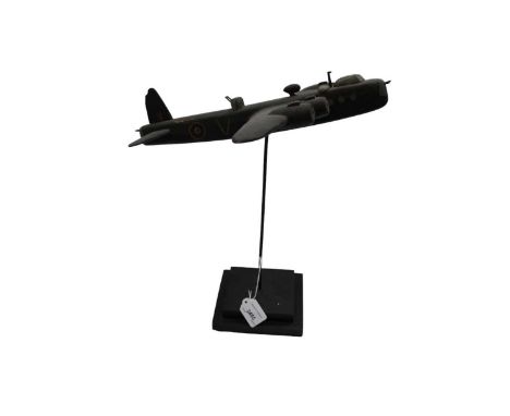 Carved and painted model of a Second World War Short Sterling bomber on plinth base, 43cm high