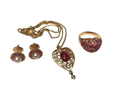 Group of Eastern yellow metal and ruby jewellery to include a bombé cluster ring, size O, heart shaped cluster pendant on cha