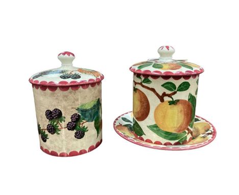 Two Wemyss pottery lidded jars together a dish, all decorated with fruitJar and stand- stand is cracked, crazed and discolour
