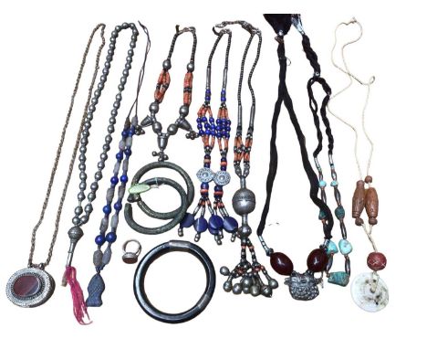 Group of Chinese and Eastern jewellery including three necklaces with coral and white metal beads, lapis lazuli necklace with