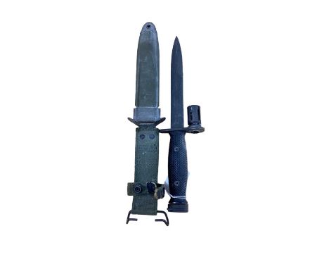 American M7 bayonet in scabbard with integral webbing frog.