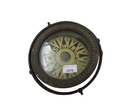 Early 20th century brass gimbal compass by J.C. West & Co.