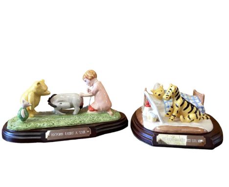 Five Royal Doulton limited edition Winnie The Pooh figures on plinth bases - Going Sledging, Eeyore Loses A Tail, The Brain O