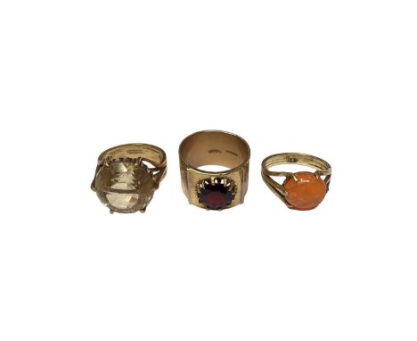 Late 1960s 18ct gold citrine cocktail ring, size N½, 1970s 18ct gold garnet cocktail ring on wide bark effect band, size P an