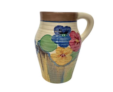 Clarice Cliff Newport Pottery Bizarre range pansies jug with hand painted decoration, 15.5cm high