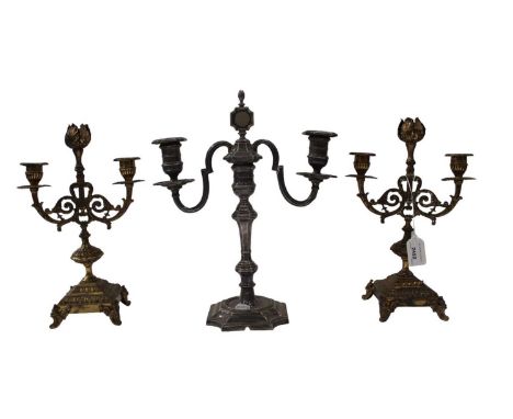Pair of 19th century French gothic brass candlesticks and a good quality silver plated two branch candlestick (3)