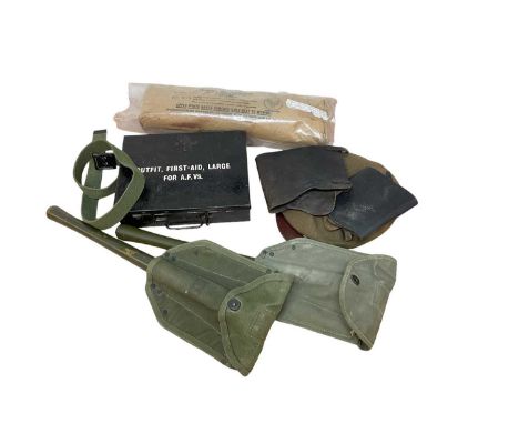 Second World War USAAF Bomber Crews Major Wound Dressing, dated 1944, together with a British Military issue First Aid tin da