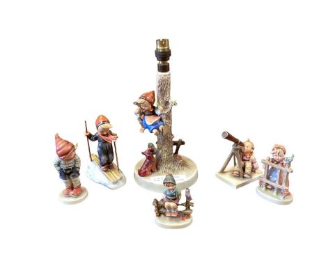 Six Hummel figures including a figural lamp, plus two various dogs (8)