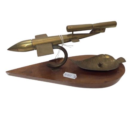 Second World War brass Trench art desk lighter in the from of a V1 Flying Bomb, 23.5cm long