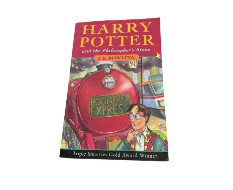 J. K. Rowling - Harry Potter and the Philosopher's Stone, early paperback edition, published 1997 with number line running 60