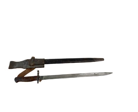 First World War 1913 pattern Remington bayonet in scabbard with integral leather frog.
