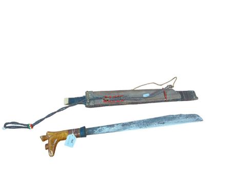 Borneo Dayak headhunter's sword, wooden hilt with wire bound grip, in wood scabbard with inlaid bone decoration.
