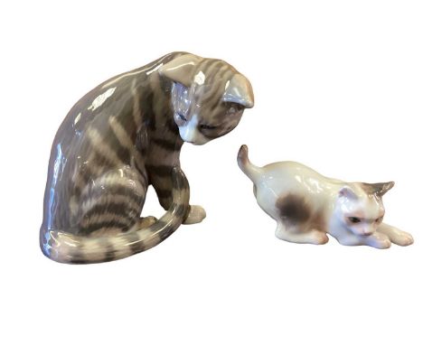 Royal Copenhagen model of a cat no.301, together with a Bing &amp; Grondahl cat no.1013 (2)Both are in very good condition 