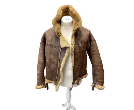 Vintage Irvin style brown leather and sheepskin flying jacket, the zip marked lightning, estimated to be around a medium in s