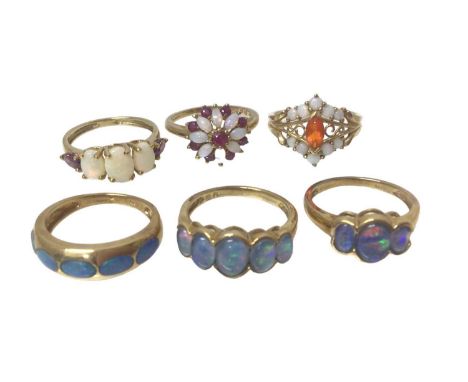 Six 9ct gold opal and opal doublet rings, sizes K- K½Total weight 12.5 grams