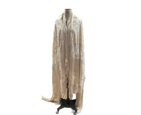 Chinese cream silk piano shawl with all over cream embroidery and fringing. 120cm x 130 cm approximately.Condition is good, s