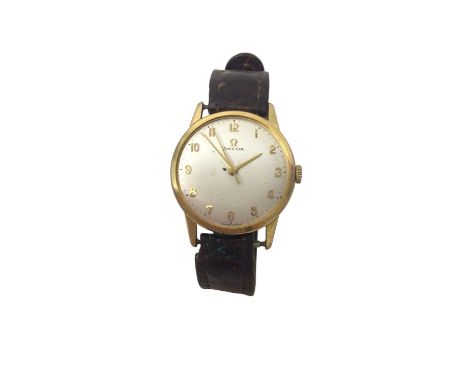 Omega wristwatch with a circular dial and Arabic numeral markers in gold plated stainless steel case (glass missing), 33mm di