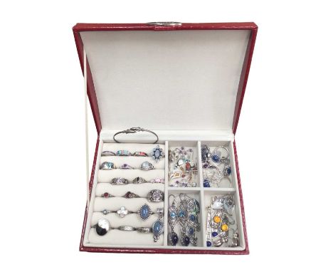 Group of silver jewellery to include various gem set rings, gem set earrings, an opal triplet pendant and a torque bangle wit