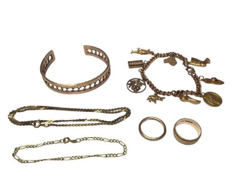 Group of 9ct gold jewellery to include a torque bangle, a gold charm bracelet, two wedding rings, bracelet and chainTotal wei