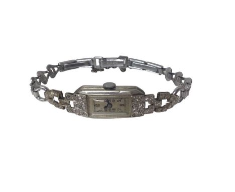 Art Deco platinum and diamond cocktail watch with rectangular dial in platinum case set with single cut diamonds and fancy lu